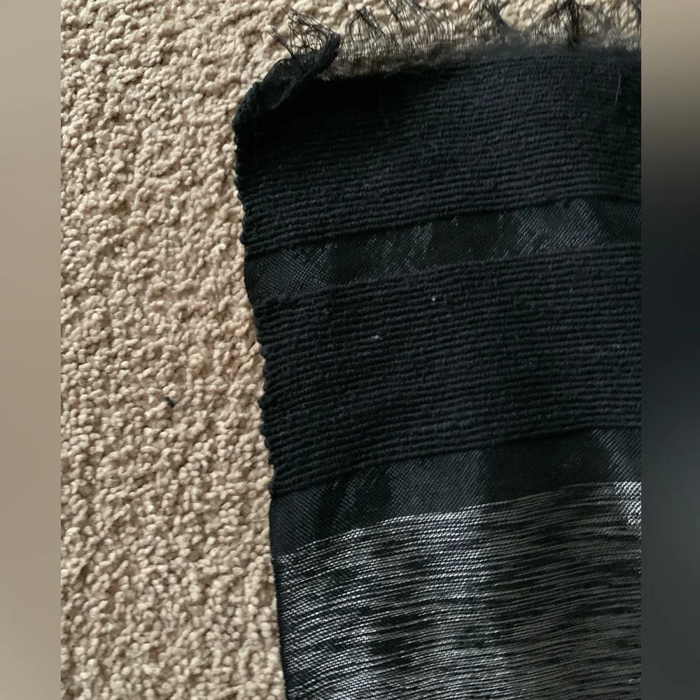 Black an silver material or table cloth